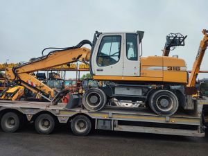 Arrivé pelle sur pneus Liebherr 316
